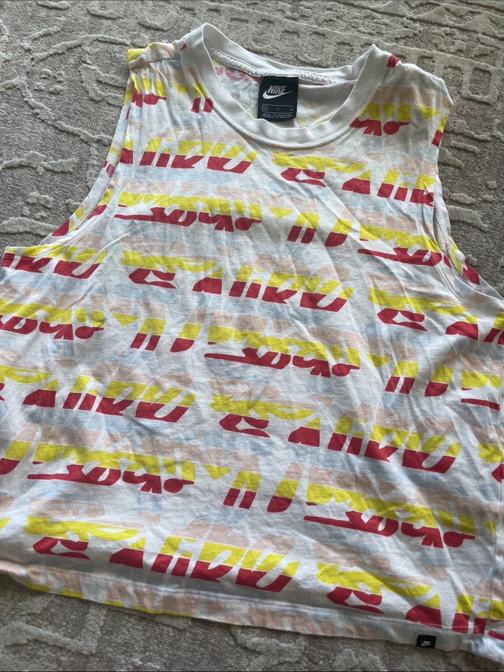 Nike White Tee with Red, Yellow & Pink Graphic Details